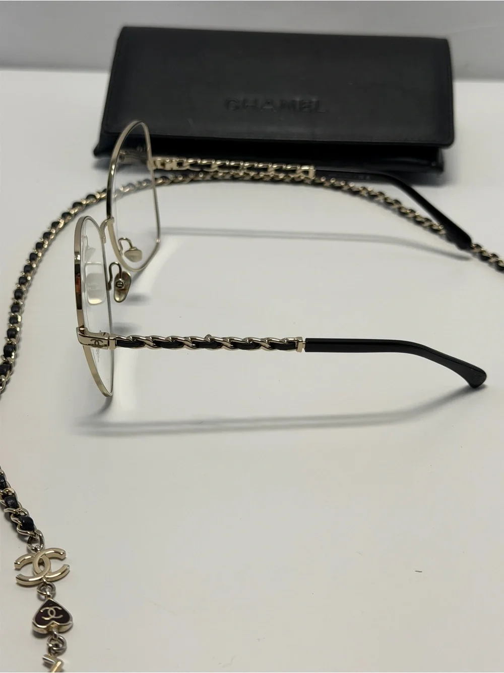 CHANEL  Gold and Black Eye ear Chain with Silver-Tone Glasses